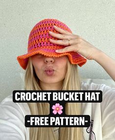 a woman wearing a crochet bucket hat with the words free pattern below it