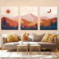 three paintings on the wall above a couch in a living room