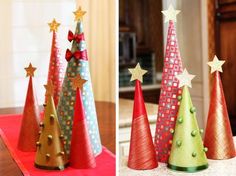 three different colored christmas trees on top of a table