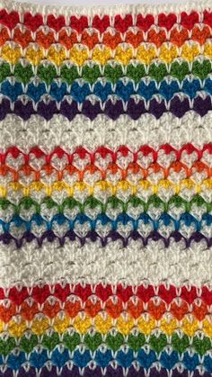 This is a really fun crochet pattern, for creating a pretty and cosy rainbow Afghan.

The blanket is double sided, little hearts are crocheted on both sides !!
************************************************
Each step in the pattern is described in detail and includes a picture. I’ve tried to make it as easy as possible to follow :)

The example shown in the pictures is of a baby blanket 27.5 inches X 31.5 inches (70 X 80 cm), but you can crochet it in any size you like.