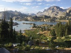 a mountain lake surrounded by trees and rocks