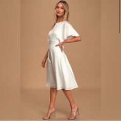 Lulus Exclusive! Make It A Memorable Night Out On The Town With The Lulus Cabaret Queen White Polka Dot Embossed Satin Backless Midi Dress! Woven Satin, With Embossed Polka Dots, Falls From A Rounded Neckline, Into Fluttering Short Sleeves. A Fitted Bodice Sits Above A Banded Waist And Flirty A-Line Midi Skirt. A Back Keyhole With Top Button Closure, A Tying Sash At The Waist, And A Back Cutout (With A Bit Of Elastic For Fit) Completes This Sultry Look! Hidden Side Zipper. Fully Lined. Self: 100 Womens White Dresses, Midi White Dress With Sleeves, Wedding Rehearsal Dresses, Long Sleeve Midi White Dress, White Dress For Wedding Guest, Confirmation Outfits For Women, What To Wear To An Engagement Party, Dress Rehearsal Outfit The Bride, White Midi Dress Classy