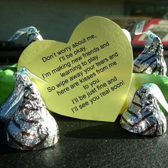 two pieces of foil wrapped in tinfoil sitting on top of a table