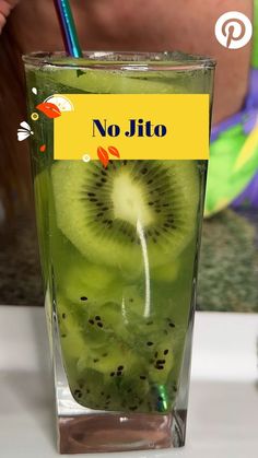 there is a green drink with kiwi slices in it and the name no jito