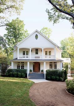 a large white house with lots of windows