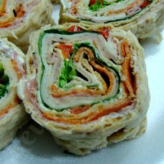 several different types of food on a white plate