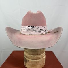 *PRICE INCLUDES $15 HAT BOX* Premium Wool Felt  4 1/4 Crown, 3 3/4 inch brim Custom Color, Distressing, Band and Accessories Colors may vary slightly.Although each hat is unique a similar hat can be made in Dri-lex sweatband for added comfort All Sales Final Pink Felt Cowboy Hat, Pink Western Hats, Cowgirl Hats Western, Hat Bar, Custom Cowboy Hats, Girl Hats, Fashion 2000, Pink Cowboy Hat, Felt Cowboy Hats