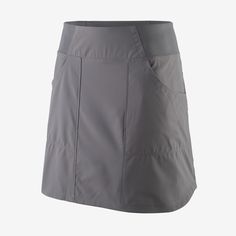 Designed for flats fishing and wet wading, our Tech Skort is made from a lightweight, moisture-wicking and quick-drying polyester/spandex blend with a DWR (durable water repellent) finish and 50+ UPF sun protection. The outer skirt offers effortless movement, while the built-in interior shorts are comfortable, convenient and versatile. Comfort stretch waistband lies flat next to skin and provides all-day comfort. Two front pockets and one side pocket that secures with a zipper; cell phone pocket High Waisted Athletic Shorts, Womens Skorts, Skort Dress, Patagonia Women, Athletic Skirt, Sports Skirts, Travel Hiking, Cycling Shorts, Casual Skirts
