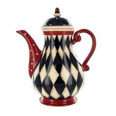 a black and white checkered teapot with red trimmings on the top