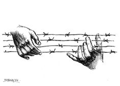 two hands reaching for each other over barbed wire