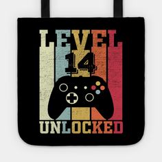 a black tote bag with an image of a video game controller