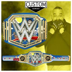 a man standing in front of a wrestling belt with the words custom written on it