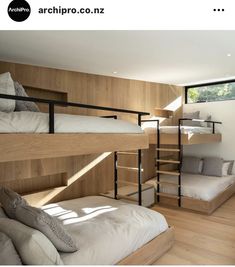 there are bunk beds in the room with stairs to the second floor and another bed below