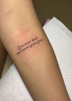 a woman's arm with a tattoo saying if you never had whatever grace