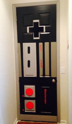 a door decorated with black, white and red items