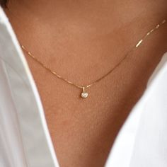 14K Solid Gold Tiny Diamond Charm Necklace ♡ The tiny diamond is about 1.9mm. It is tiny. ♡ 14K gold necklace is 0.5mm box chain ♡ 14K gold components Please read our policies before you place your order. https://www.etsy.com/shop/SashJewelry/policy?ref=shopinfo_policies_leftnav To see add-on click on the link below. https://www.etsy.com/shop/SashJewelry?section_id=12359884 To see more children's jewelry click on the link below. http://www.etsy.com/shop/SashJewelry?section_id=12441132 To see mor Tiny Gold Pendant, Tiny Diamond Necklace, Tiny Gold Necklace, Small Gold Necklace, Diamond Charm Necklace, Multi Chain Bracelet, Double Chain Bracelet, Children's Jewelry, Heirloom Jewelry