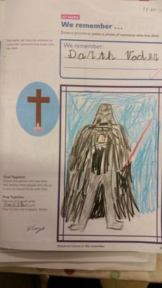 a child's drawing of darth vader is on top of some paper