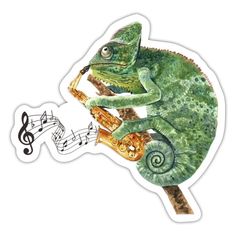 a green chamelon sitting on top of a musical note