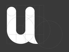 the letter u is made up of circles and lines on a black background with white letters