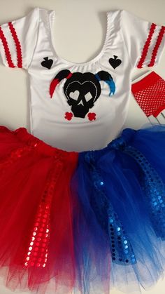 a red, white and blue dress with a skull on it