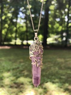 Floral Wrapped Amethyst Crystal Necklace | Silver Chain | Light Years Purple Crystal Pendant, Crystal Pendant Necklace Aesthetic, Real Crystal Necklace, Amethyst Necklace Aesthetic, Pink Quartz Necklace, Sophie Kotlc, Crystal Necklace Outfit, Crystal Necklace Aesthetic, Cloud Serpent