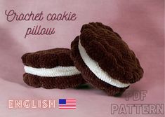 two crochet cookie pillows are shown on a pink background with the words english