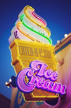 the neon ice cream sign is lit up