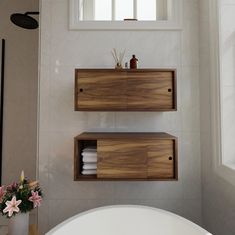 two wooden shelves in the corner of a bathroom