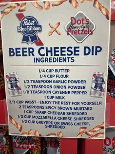 a sign advertising beer cheese dips at a store