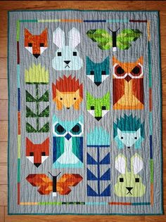 a quilt with many different animals on it