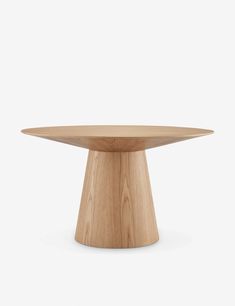 a round wooden table on a white background with the top turned down to look like it has been made out of wood