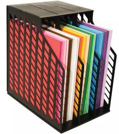 a stack of folders sitting on top of each other in a black holder with dividers