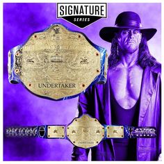 the wrestler is wearing a purple hat and holding his wwe championship belt in front of him
