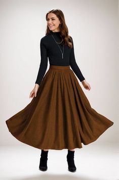 A midi skirt is an item that every lady should own. Not only do these full-length skirts look fantastic, but they're also seriously versatile. When styled right, they can suit a range of occasions along with every season. Additionally, the comfortable and chic style can flatter anybody. DETAILS: * More colors available(Fabric NO.3)    https://etsy.me/3y7DZnn * 1950s style circle skirt, very full skirt but hangs smoothly from the waist without darts, pleats, or gathers * Circle skirt is a basic item, so can pair it with a lot of things * Vintage High waisted full circle skirt, Make you look tall when wear it * Flare swing skirt, Make the waist look thin and not look bloated * 30% wool, 30% fiber, 40% polyester, medium weight wool  * fully satiny lining, only attached at the waist, more nice Long Wool Skirt, Chic Fall Fashion, Geek Chic Fashion, Skirt Wool, Pleated Long Skirt, Full Length Skirts, 1950s Style, Langer Rock, Winter Skirt