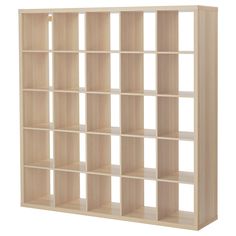 an empty bookcase with several shelves on each side and one section missing from the front