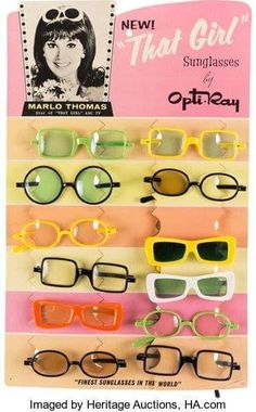 an assortment of sunglasses with different colors and styles on each eyeglasses, including the woman's face