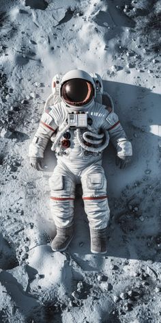an astronaut is laying on the moon