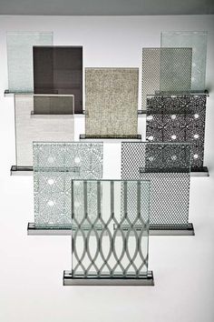 an assortment of glass and metal items on a white surface with no one in the photo