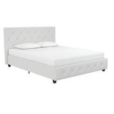 a bed with white linens and black legs is shown in front of a white background