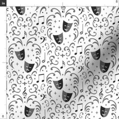 a sheet with black and white masks on it, surrounded by musical notes in the background