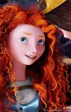 a close up of a doll with red hair