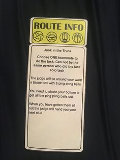 a black jacket with a yellow and white sign that says route info on the back