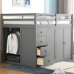 a gray bunk bed with drawers underneath it