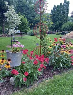 a garden filled with lots of colorful flowers