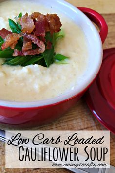 low carb loaded cauliflower soup in a red bowl with bacon on top