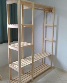 a wooden shelving unit in a room