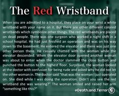 the red wristband is written in black and white