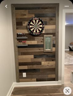 a dart board mounted to the side of a wall