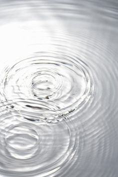 water ripples on the surface with white background royalty images and clippings stock photos