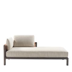 a chaise lounge chair with wooden legs and fabric upholstered backrests